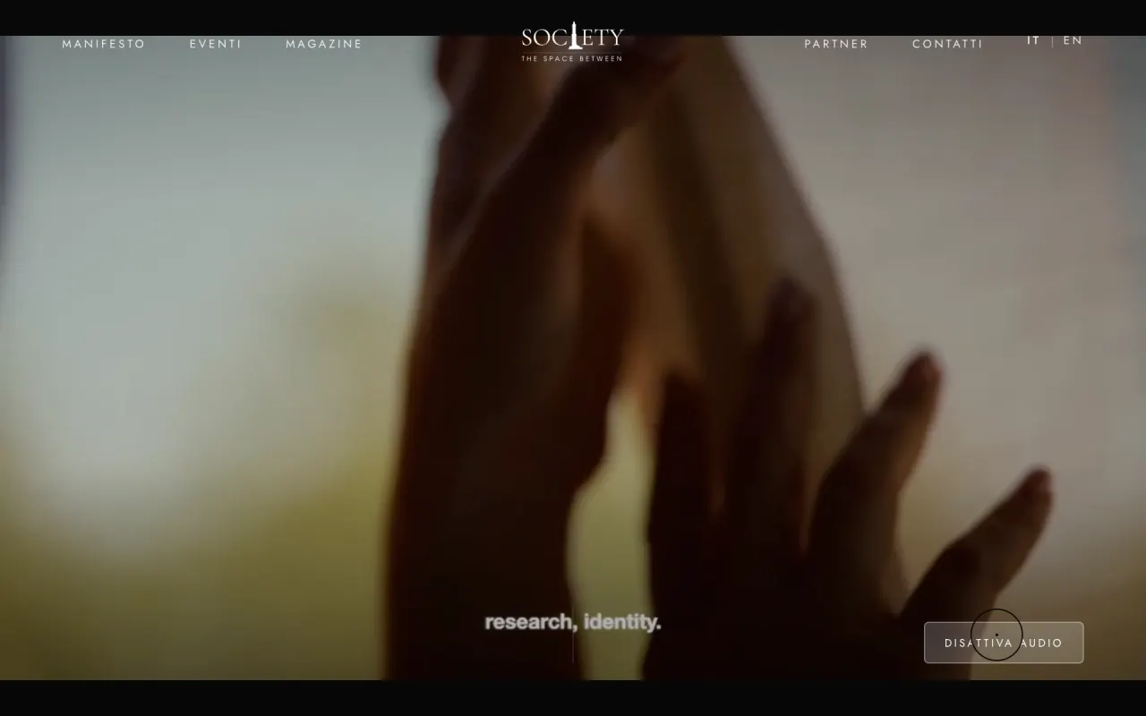 Society: the site opening with a full-screen video and the navigation menu.
